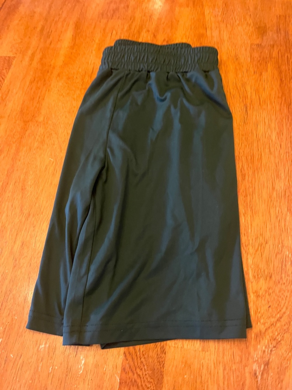 Boys Youth medium dark green shorts